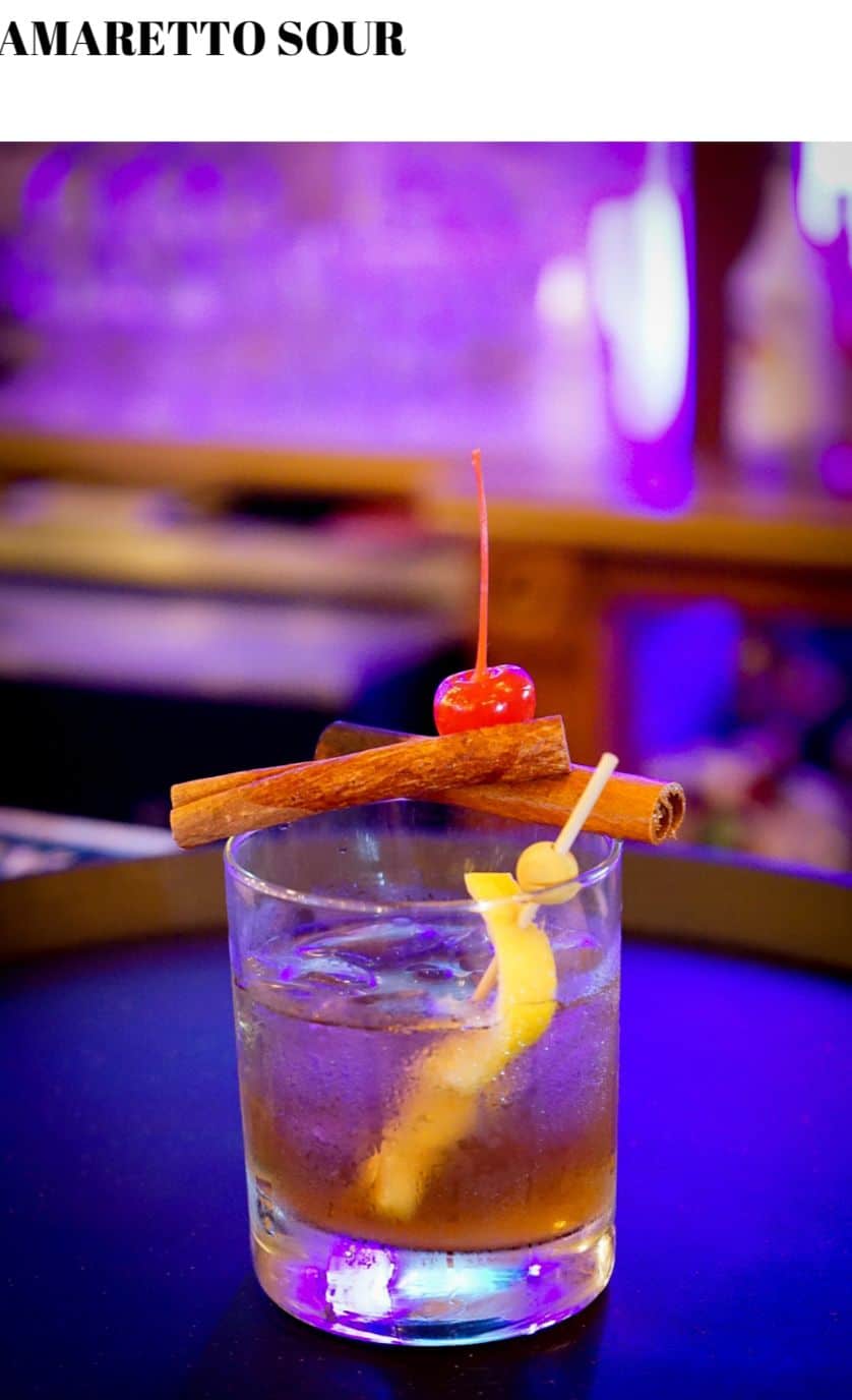 A cocktail with cinnamon sticks and a cinnamon stick.