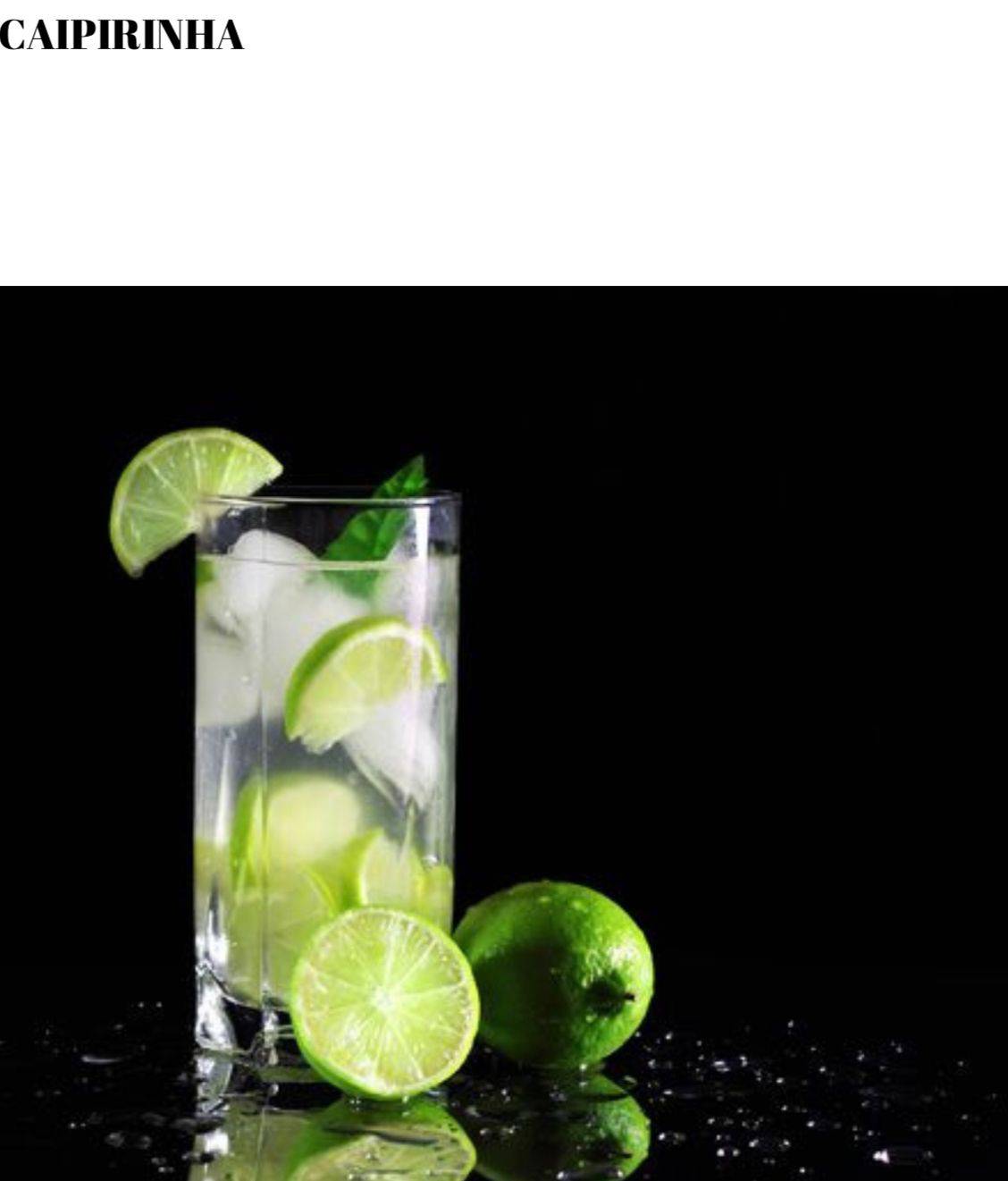 A glass of water with lime slices and ice.